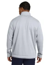 Buzo azul marino de Under Armour, modelo Storm Sweaterfleece, con cuello alto, cierre de cremallera hasta el pecho y logo bordado en el puño.