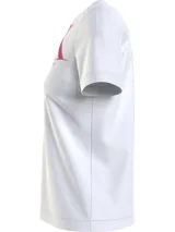 Remera blanca de algodón con cuello redondo y mangas cortas. Estampado frontal con el monograma CK en color fucsia con efecto spray y logo de Calvin Klein Jeans.