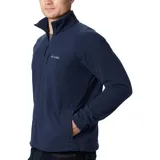 Campera polar Columbia Fast Trek II Fleece color celeste, con cierre frontal, cuello alto, bolsillos laterales con cierre y bolsillo en el pecho con cierre.