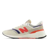 Championes New Balance 997 unisex color beige con detalles en rojo, azul y blanco.