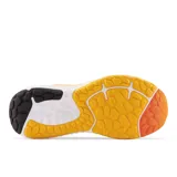 Championes de running New Balance Evoz v2 para hombre, color negro con detalles en naranja y azul.