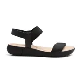 Sandalias bajas color salmón con tiras elásticas y suela blanca.