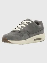 Zapatillas Hush Puppies Brandhall color beige de cuero descarne, con suela de goma EVA con tecnología Air.