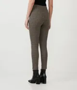 Pantalón legging con estampado pied de poule, cintura elastizada y corte ajustado.