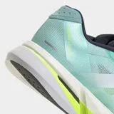 Championes Adidas Adizero Boston 13, color celeste con detalles en blanco y amarillo. Diseñados para running, con tecnología Lightstrike Pro y suela Lighttraxion.