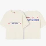 Camiseta celeste con estampado frontal y trasero con el texto "Ittai Stars" en color rojo y azul.