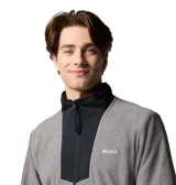 Campera polar Columbia Sequoia Grove color gris con detalles en negro, cierre frontal completo, cuello alto, bolsillos laterales con cierre y logo bordado en el pecho.