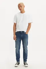 Jean de corte skinny color azul, tiro alto, confeccionado en tejido stretch.