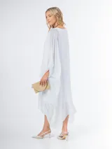 Vestido túnica blanco de seda italiana con frunce, calce oversized y talle único. Lleva forro elastizado al tono.