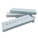 Reloj Rosefield modelo The Boxy XS con caja cuadrada de acero color oro rosa y esfera blanca. La malla es de acero color oro rosa.