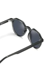 Gafas de sol redondas color champagne con lentes grises.