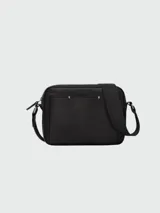 Bolso bandolera Longchamp modelo Sur Seine, diseñado para cámara fotográfica. Color negro con detalles en verde y correa de tela ajustable.