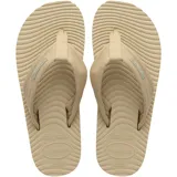 Ojotas Havaianas modelo Surfer Coast color beige con tiras de tela y suela texturizada.