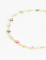 Pulsera dorada con cadena de eslabones y cuentas redondas de colores con diseño de ojo turco.
