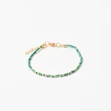 Pulsera con cuentas de tono verde y detalles en dorado, de diseño delicado.