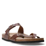 Sandalias bajas de cuero marrón con plantilla anatómica y hebillas ajustables.