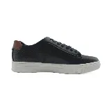 Zapatillas urbanas Panama Jack de cuero sintético color azul marino, con cordones y suela blanca. Detalle de cuero marrón en el talón.