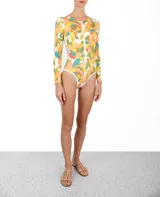 Entero de lycra con estampado floral multicolor, cierre frontal con cremallera y mangas largas.
