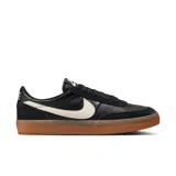 Zapatillas de mujer color negro, con diseño clásico de perfil bajo y detalles en gamuza.