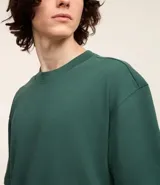 Remera relaxed de algodón con efecto grueso, color azul marino, cuello redondo y manga corta.