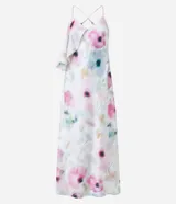 Vestido midi de breteles finos con estampado floral, escote en V y volado en el busto. Confeccionado en tejido satinado con escote degagê en la espalda.