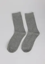 Par de medias media caña color gris.