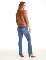 Buzo de tejido acanalado color mostaza, con escote tipo bote y mangas 3/4 estilo japonés.