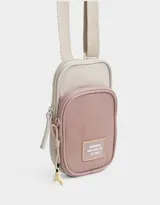 Portacelular bicolor rosa y beige con bolsillo frontal y correa regulable.