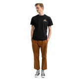 Remera negra de algodón con estampado pequeño en el pecho izquierdo con el logo de la marca Rhythm.