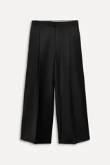 Pantalón negro de tiro alto con pinzas delanteras, corte ancho y largo midi.