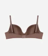 Soutien color nude de microfibra texturizada, con breteles ajustables y copas huecas.
