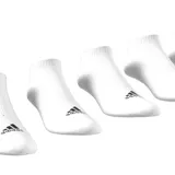 Pack de tres pares de medias Adidas blancas de corte tobillero, con logo de la marca en negro.