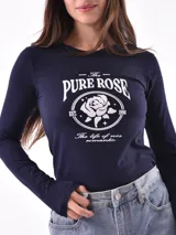Remera color tostado de manga larga con cuello redondo y estampado de un águila y la palabra 'Merica.