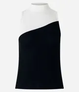 Musculosa de rib acanalado con cuello alto y diseño de bloques de color blanco y negro.