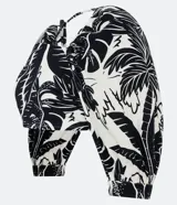 Top corto de lino, con tiras para lazo en la espalda, mangas 3/4, lastex en la parte trasera y estampa floral estilo tropical.