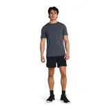 Remera deportiva Under Armour Vanish Seamless de hombre, color negro con logo plateado en el pecho. Confeccionada en tejido transpirable de secado rápido y sin costuras para evitar el roce.
