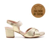 Sandalias de cuero negro con taco bloque, tiras cruzadas en el empeine y pulsera elástica en el tobillo.