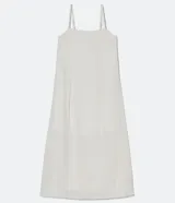 Vestido midi blanco de lino con tirantes finos y escote cuadrado.