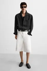 Mocasín negro de piel abatanada con suela ultrafina.