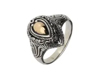 Anillo de plata 925 con diseño de lágrima labrado y lámina de oro 18k.