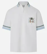 Camisa masculina de algodón con corte boxy, cuello con solapa y rayas, abotonado delantero, bolsillo con estampa floral y estampa trasera de palmera con la palabra 'Paradise'.