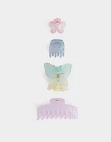 Set de cuatro broches para el pelo de plástico translúcido en colores pastel: rosa con forma de flor, celeste con forma de peine, verde y amarillo con forma de mariposa, y lila con forma de peine.