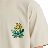 Remera color beige con estampado de un girasol en el pecho.