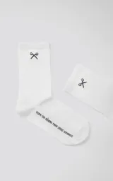 Medias 3/4 blancas de algodón con logo de Luxo en la botamanga y estampado de tijeras.