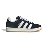 Championes Adidas Campus 00s, color negro con las tres tiras laterales blancas, detalle de la palabra "Campus" en el lateral y suela color hueso con base marrón.