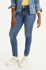 Jeans de tiro alto color azul medio, corte skinny.
