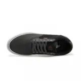 Championes Etnies Blitz de lona azul marino con logo de la marca en el lateral y suela de goma color caramelo.
