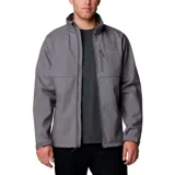 Chaqueta softshell Columbia para hombre, color gris, con cierre frontal, cuello alto, puños y dobladillo ajustables. Presenta bolsillos laterales y un bolsillo en el pecho, todos con cierre.