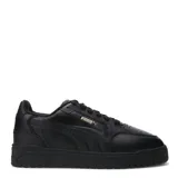Championes Puma Shuffle Downtown, color blanco con detalles en negro y dorado. Zapatillas de cuero sintético con suela de goma.