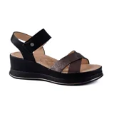 Sandalias negras de plataforma con taco corrido, tiras cruzadas con glitter y pulsera con hebilla en el tobillo.